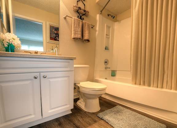 Upgraded bathrooms are fresh and modern.