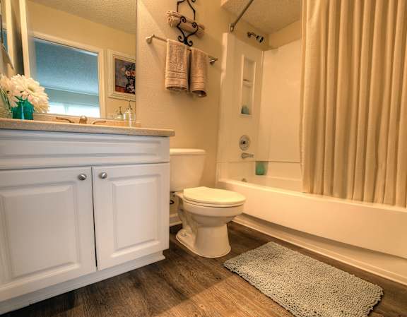 Upgraded bathrooms are fresh and modern.