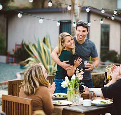 Friends enjoying the garden at Mitchell Place Apartments in Murrieta, CA