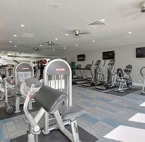 a gym with a bunch of exercise equipment in it at KIRKER CREEK, Pittsburg, CA, 94565