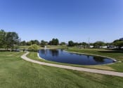 Thumbnail 24 of 26 - walking trails around a large pond