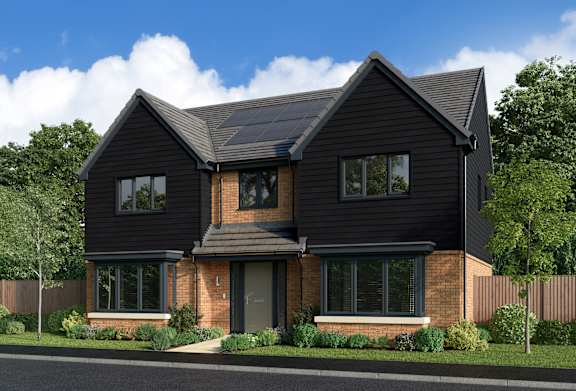 A modern house with a black exterior and a grey roof.