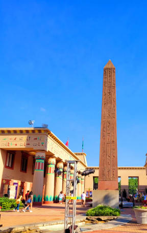 an obelisk in front of a building at The Courts Midtown, 1391 Court Ave, Memphis