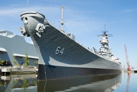 a large ship sitting on top of a body of water at Proximity at ODU, Norfolk, Virginia