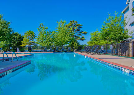 the swimming pool at the apartments for rent