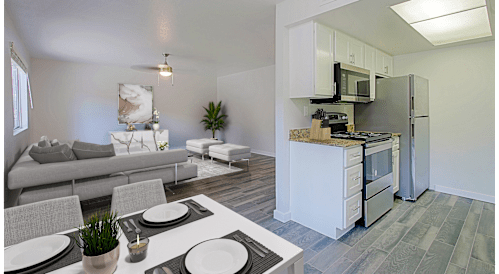 A modern kitchen with a breakfast table set up  and living area view at Aspire Mesa, Mesa,  Arizona.