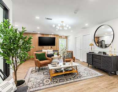 a living room with a couch and a table