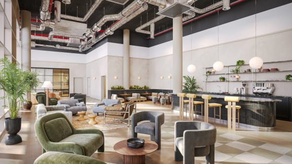 a lobby filled with chairs and tables and a bar