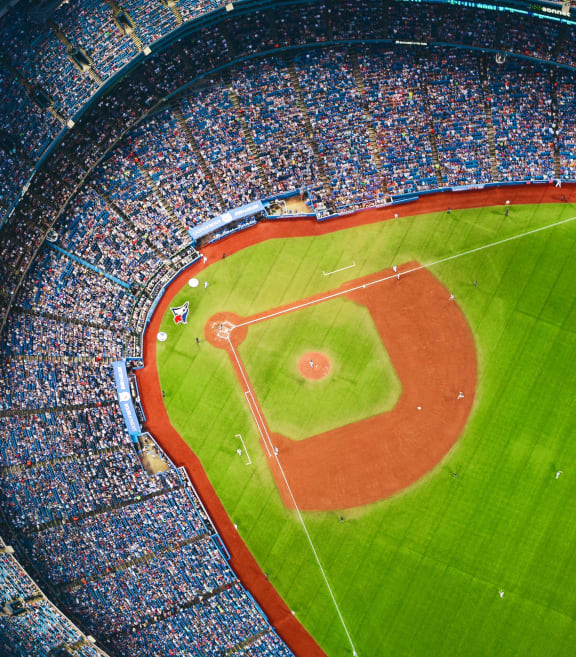 a birds eye view of a baseball stadium at night