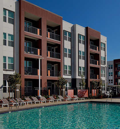 Private patios and balconies with pool view - Nova at Green Valley