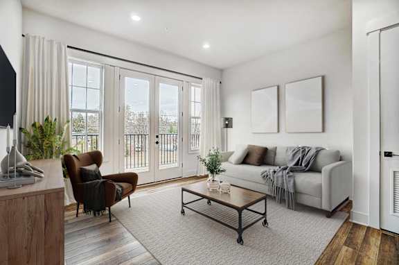 a living room with a couch and a coffee table