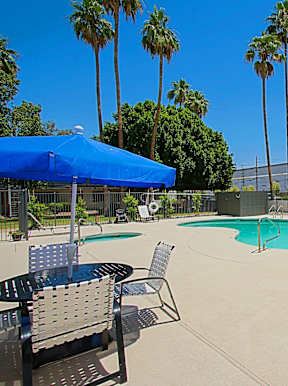 Swimming pool with sun loungers at Aspire Mesa, Mesa,  Arizona.