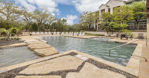 A large outdoor pool at Pecan Springs, San Antonio, 78249