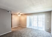 Thumbnail 14 of 23 - Spacious living room with carpet and big window