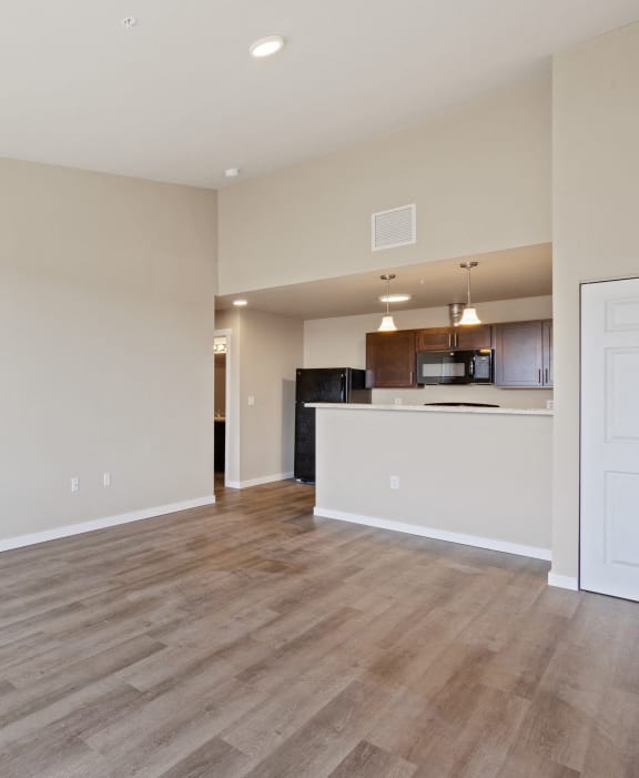 a bedroom with a closet and a door to a bathroom