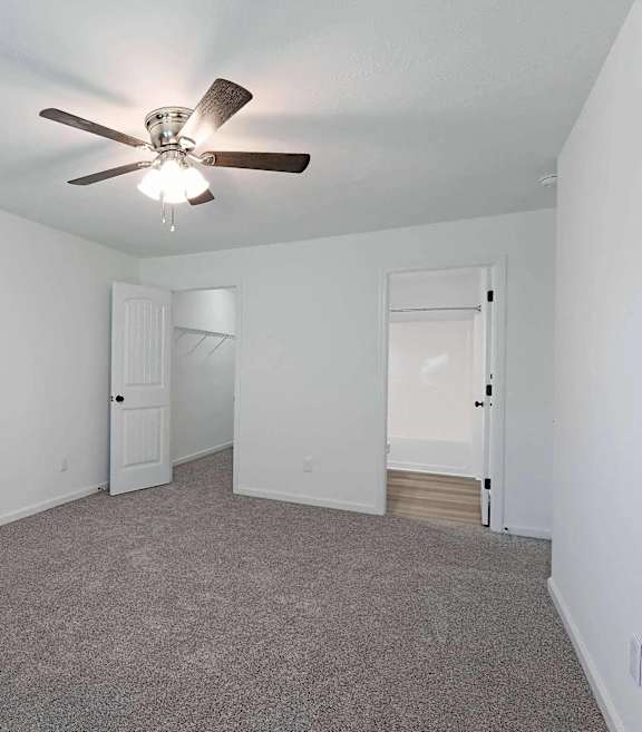 a wine cellar with white cabinets and wooden floors and a machine in the middle at Sterlington Apartments, Grovetown, GA, 30813