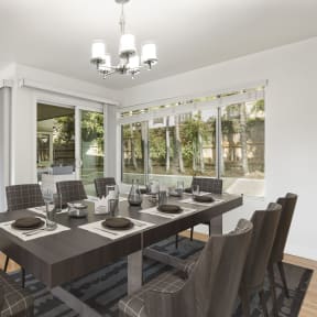 a dining room with a long wooden table and chairs at Orange Grove Circle, Pasadena, CA,91105
