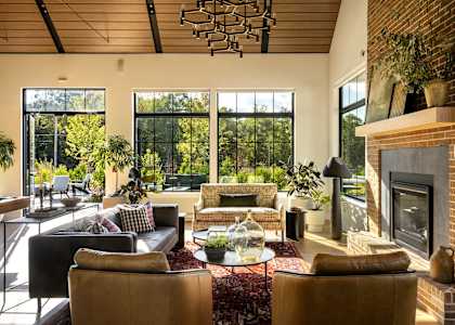 A living room with a fireplace and a couch.