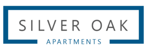 a blue rectangle with the words silver oak apartments