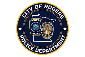 Rogers Police Department logo with a blue background.