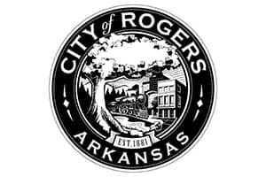 Rogers Police Department logo with a blue background.