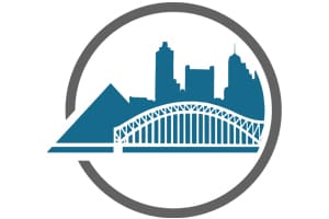 A city skyline with a bridge is depicted in a circular frame.