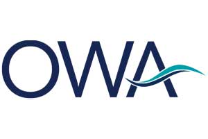 The image is a logo with the letters "OWA" and a stylized wave design.