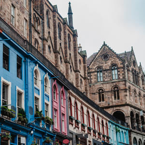 A row of buildings with brightly painted facades.