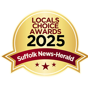 A gold and red emblem signifies the LOCALS CHOICE AWARDS 2025 presented by the Suffolk News-Herald.