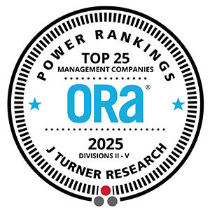 A circular emblem signifying a top 25 ORA Division ranking by J Turner Research for the year 2025.