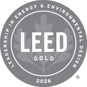 A circular logo with the text "LEED GOLD 2026" in the center.