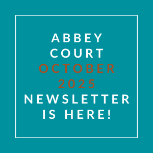 an aqua background with a white font with the words abbey court nove