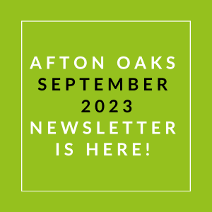 a green background with the words afton oaks september 23 newsletter is here