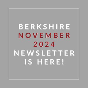 a calendar with a gray background and a red lettering