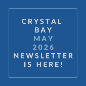 A blue square with white text announcing the Crystal Bay May 2026 newsletter.