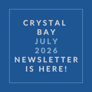 A blue square with white text announcing the Crystal Bay July 2026 newsletter.