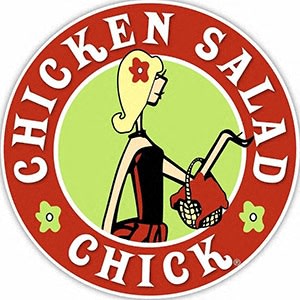 a woman in a red and green chicken shack logo