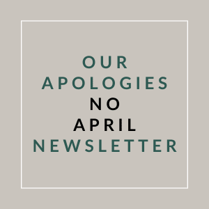 A poster with the text "Our Apologies No April Newsletter" written on it.