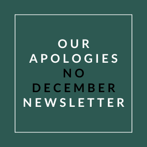 A sign that reads "Our Apologies No December Newsletter".