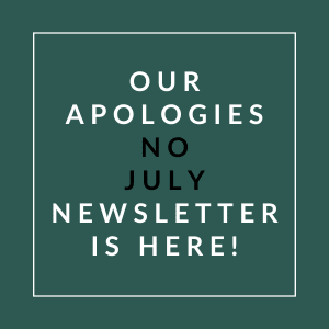 A sign that reads "Our Apologies No July Newsletter is Here!"