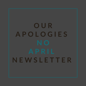 A poster with the text "Our Apologies No April Newsletter" written on it.