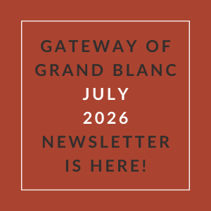 A red square with white text announcing the July 2026 newsletter for the Gateway of Grand Blanc.