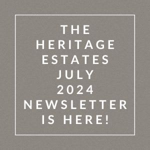 a gray background with a white frame and the words heritage estates july 2224