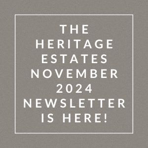 a gray background with a white box and the words the heritage estates october 2024