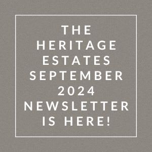 a gray background with a white border and the words the heritage estates 2021