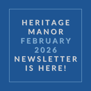 A blue square with white text announcing the Heritage Manor February 2026 newsletter.