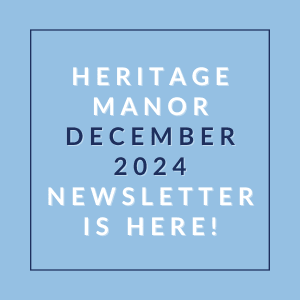 A blue square with white text announcing the Heritage Manor December 2024 newsletter.