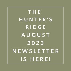 a picture of a sign that says the hunter's ridge august 23 newsletter is here