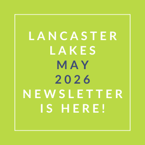 The image announces the availability of the Lancaster Lakes May 2026 newsletter.