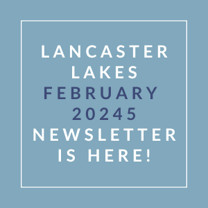 A blue square with white text announcing the Lancaster Lakes January 2024 Newsletter.